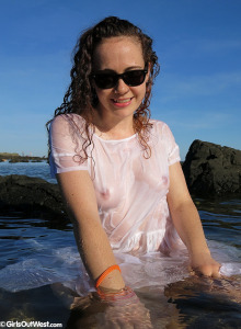 Hairy pussy Rosie outside in the water in wet white dress